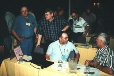 FBM instructors chatting between workshop sessions.